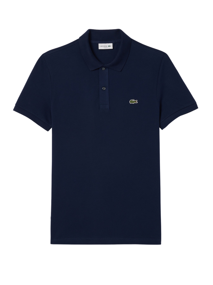 Man wearing midnight blue LACOSTE L.12.12 slim fit piqué polo shirt with signature green crocodile logo and two-button placket