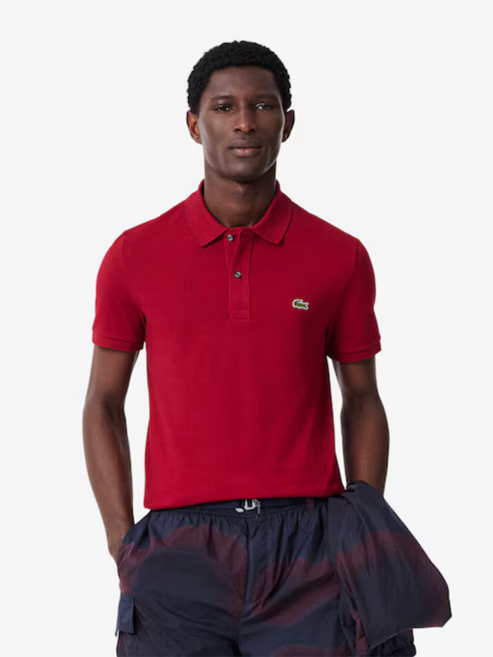 LACOSTE Slim Fit L.12.12 Piqué Polo Shirt Red - back view displaying clean lines and premium piqué cotton construction