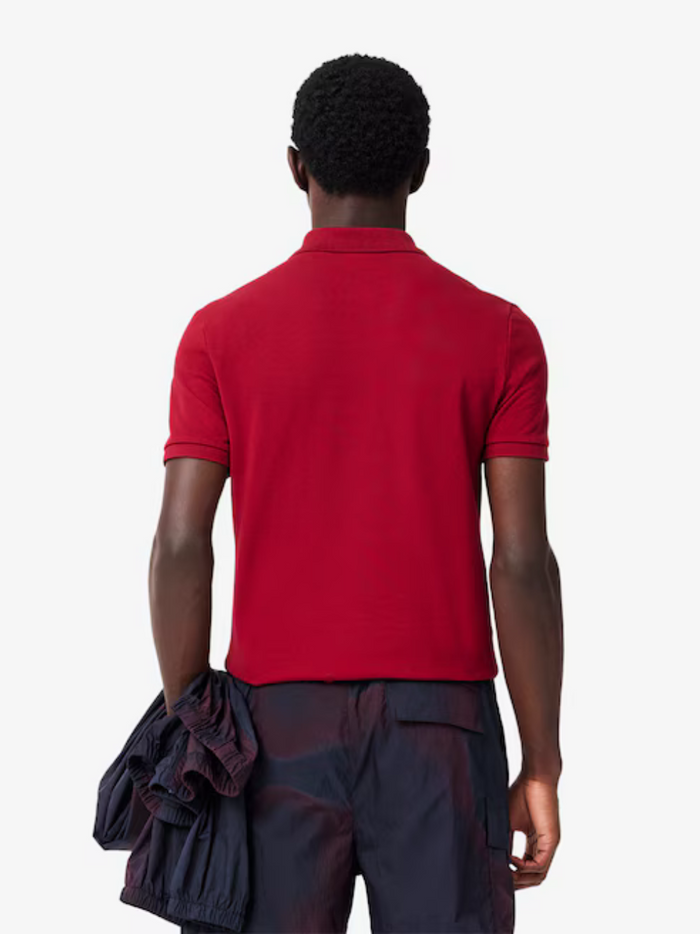 LACOSTE Slim Fit L.12.12 Piqué Polo Shirt Red - lifestyle shot or alternative angle showcasing the vibrant red colour