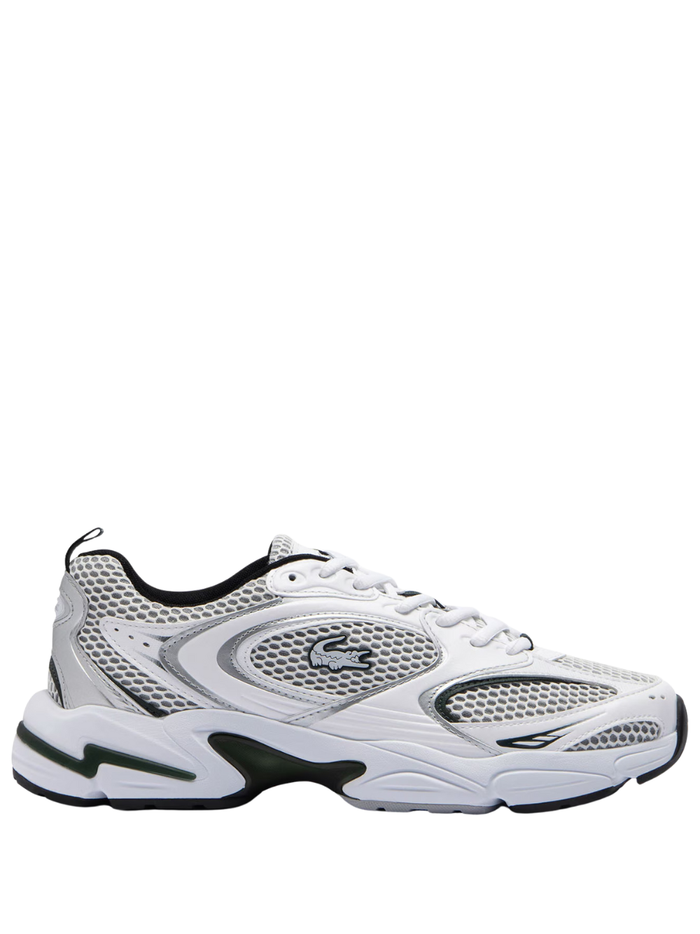 LACOSTE Storm 96 2K men's white chunky sneakers with grey and beige accents, mesh panels, green crocodile logo, and retro athletic design, side view