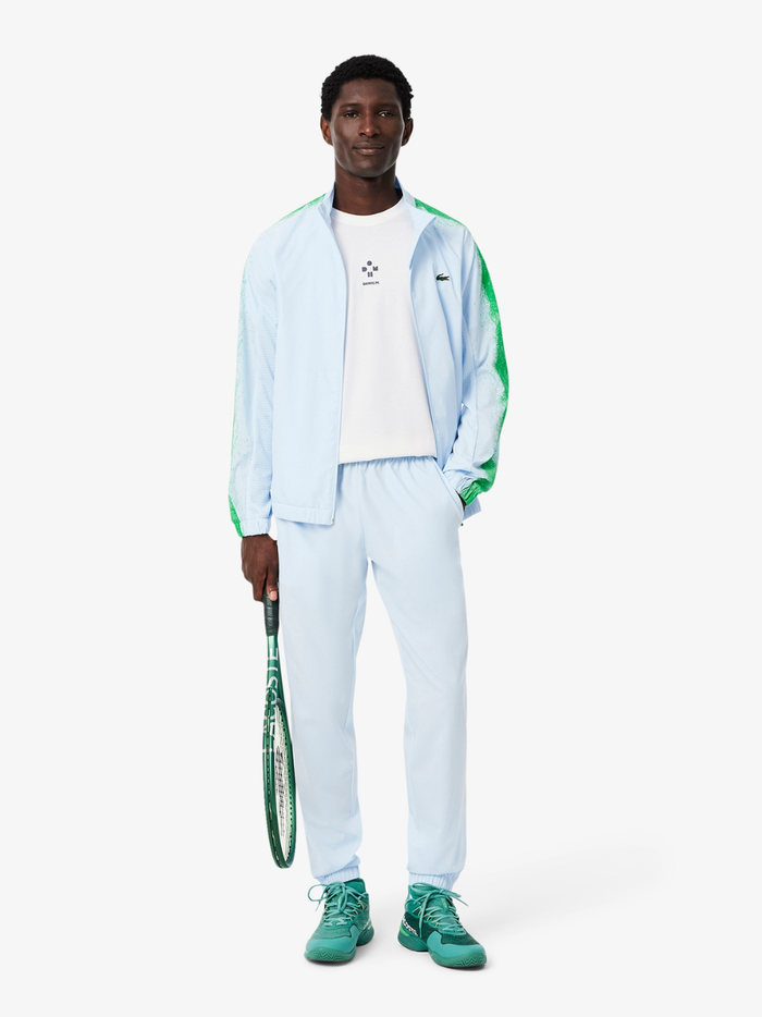 LACOSTE Tennis x Daniil Medvedev Ultra Dry T-shirt White - side profile view showing athletic fit and performance construction