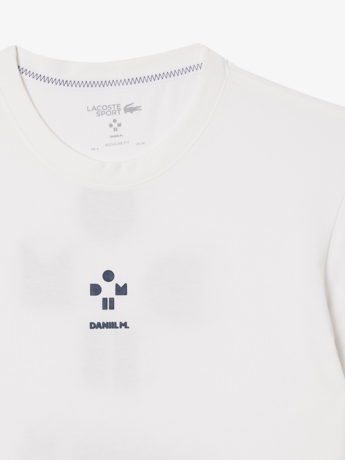 LACOSTE Tennis x Daniil Medvedev Ultra Dry T-shirt White - action shot highlighting athletic performance and professional tennis collaboration