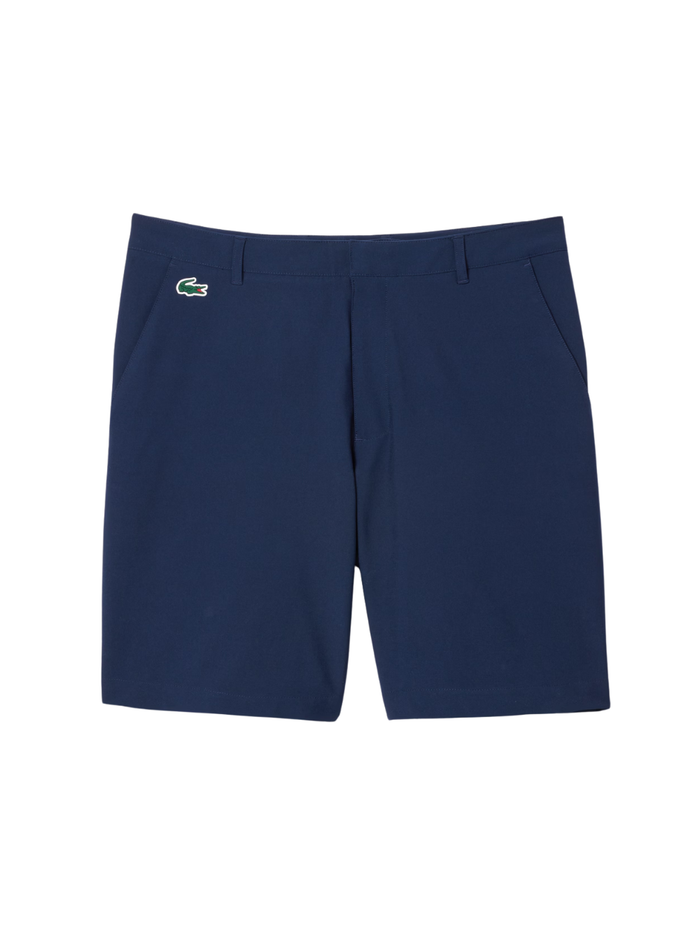 LACOSTE Ultra Dry Golf Shorts in midnight blue with silicone crocodile logo, front view