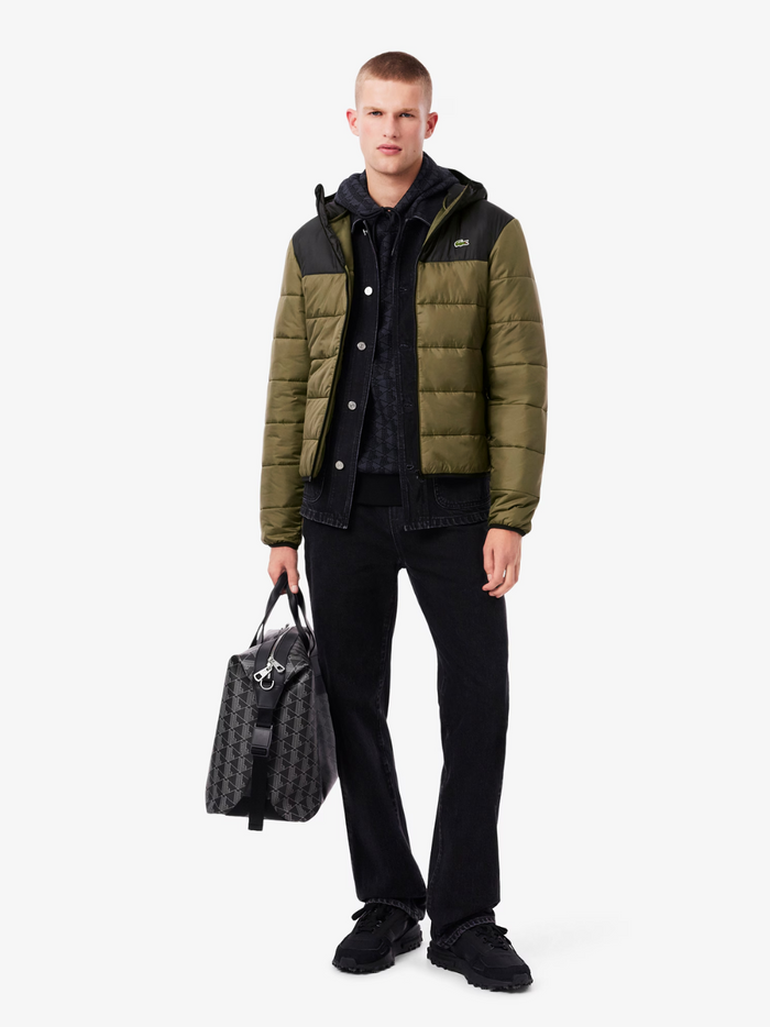 LACOSTE Water-Repellent Quilted Jacket Green - side profile view showing the jacket's fit and puffed quilted construction