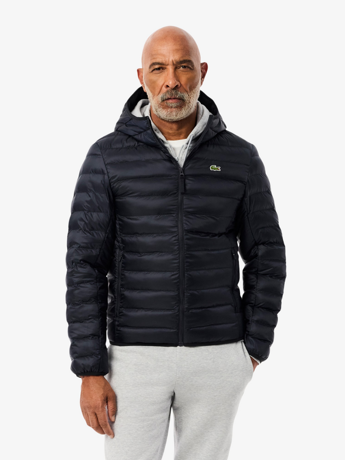 LACOSTE Water-Repellent Quilted Puffed Jacket in navy - back view displaying the quilted pattern and premium insulation throughou