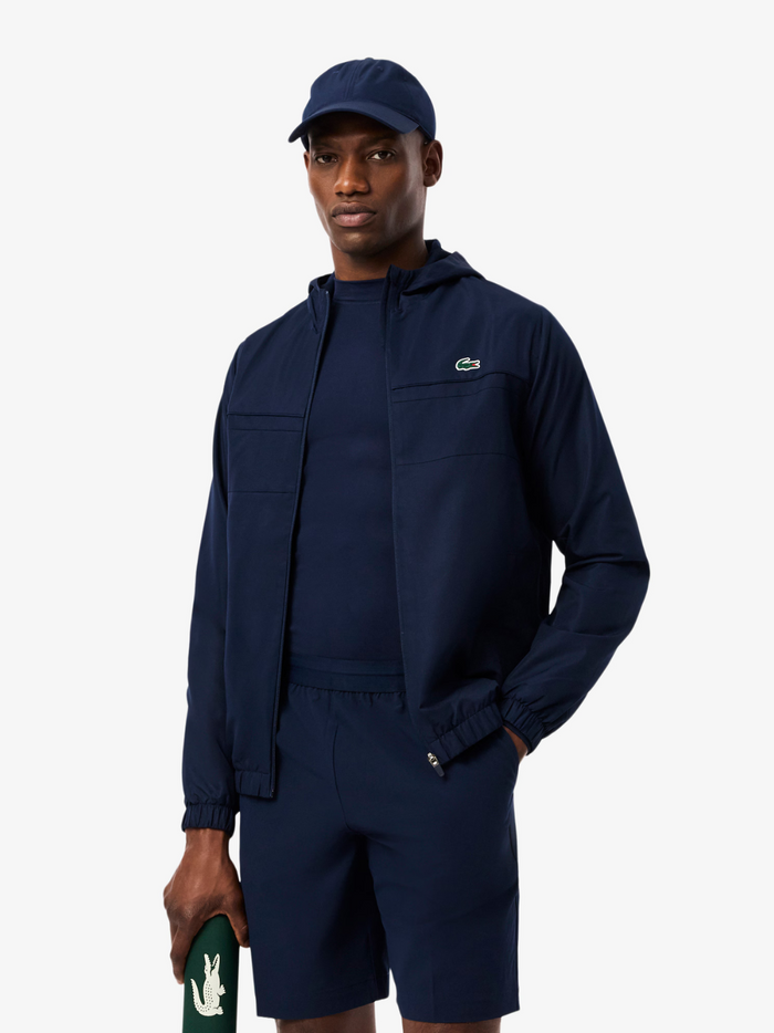 LACOSTE Navy Sport Track Jacket - Back view displaying water-repellent fabric and athletic fit design