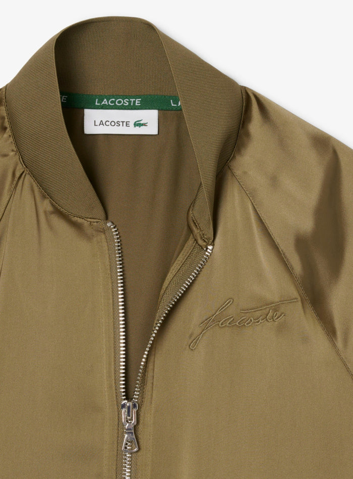 LACOSTE WOMEN Oversized Embroidered Signature Satin Bomber Jacket Khaki Green - MAISONDEFASHION.COM