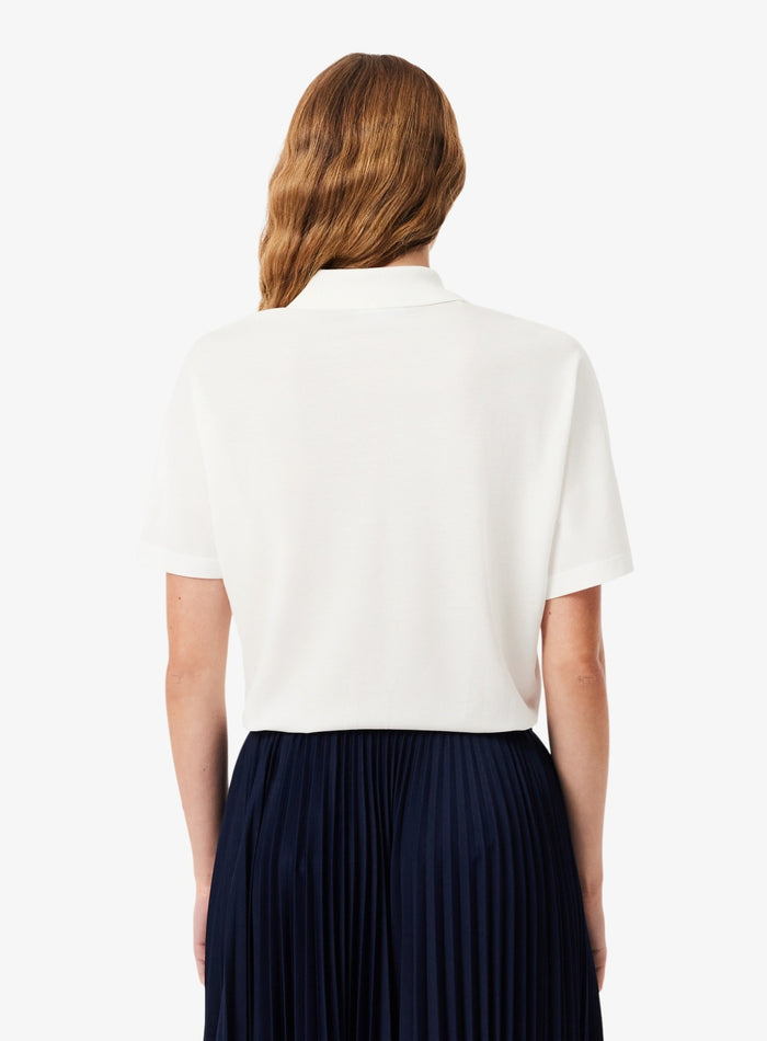 LACOSTE WOMEN Relaxed Fit Fluid Piqué Polo Shirt White - MAISONDEFASHION.COM