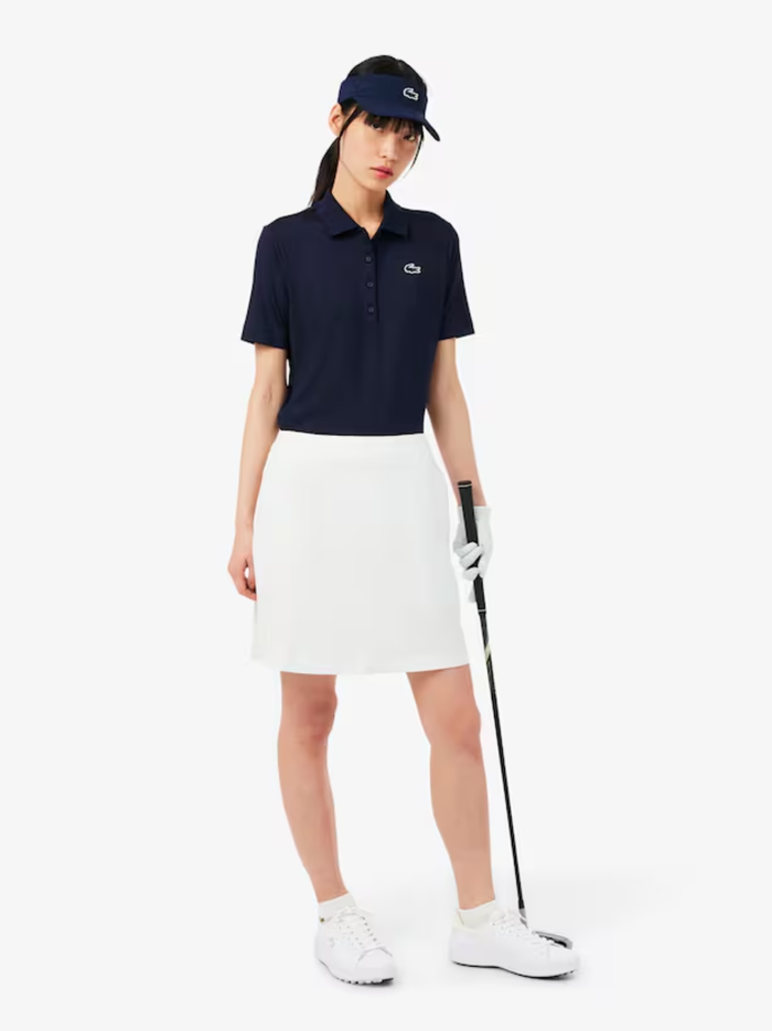 LACOSTE WOMEN Slim Fit UV Protect Stretch Golf Polo Shirt Midnight Blue - MAISONDEFASHION.COM