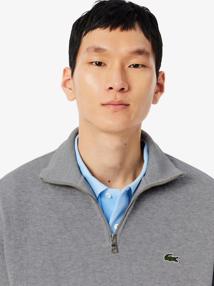 LACOSTE grey interlock sweatshirt close-up detail of zip closure mechanism and crocodile logo embroidery