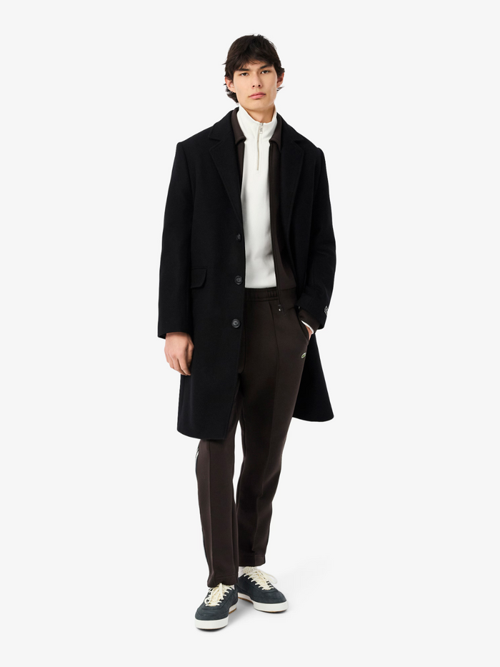 LACOSTE High Neck Zip-Up Sweatshirt White - Side profile showcasing the high neck collar and relaxed fit silhouette