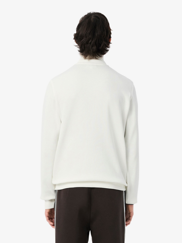 LACOSTE Interlock Sweatshirt White - Flat lay styling shot highlighting the overall garment shape and zip-up design