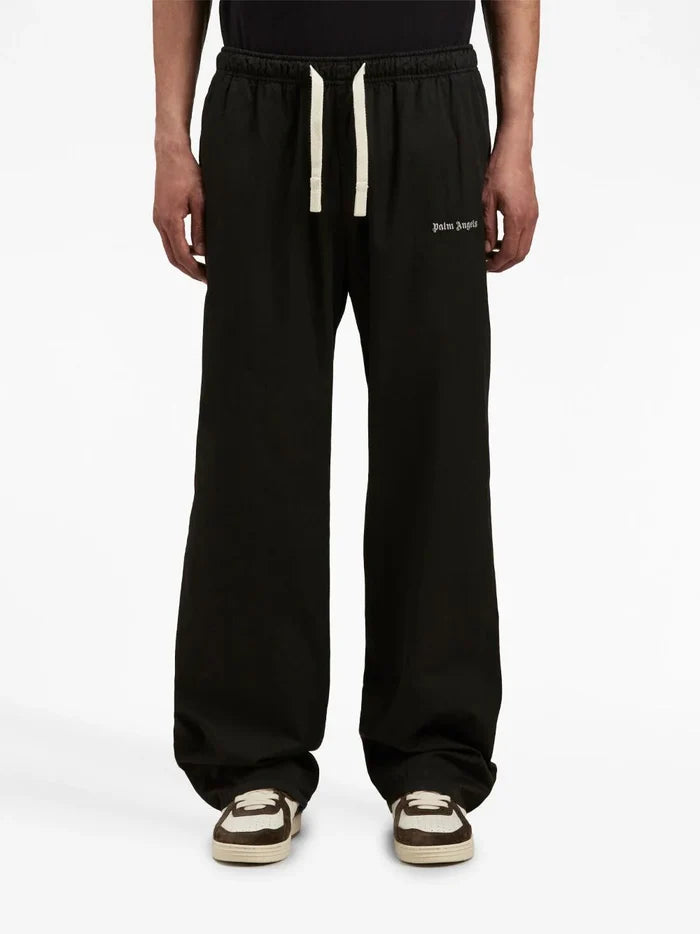 PALM ANGELS MEN Logo Cotton Travel Pants Black/White - MAISONDEFASHION.COM