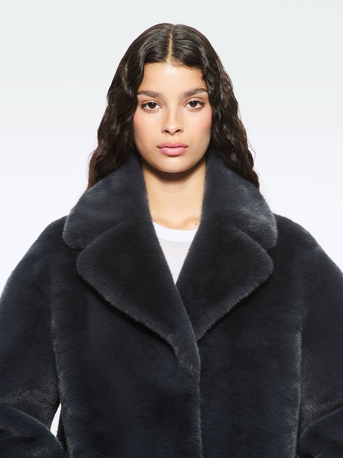 Close-up detail of STAND STUDIO Camille Cocoon Coat in Graphite Grey showing texture and craftsmanship