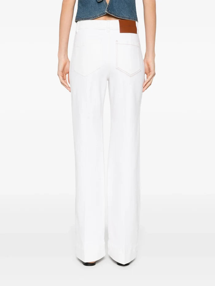 VICTORIA BECKHAM WOMEN Alina Flared Jeans Washed White - MAISONDEFASHION.COM