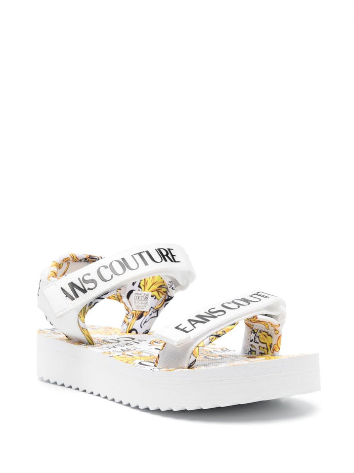 VERSACE WOMEN Baroque Logo Print Sandals White/Gold - MAISONDEFASHION.COM