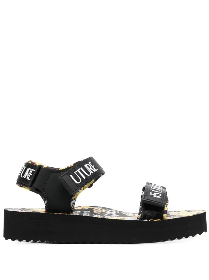 VERSACE WOMEN Baroque Logo Print Sandals Black/Gold - MAISONDEFASHION.COM